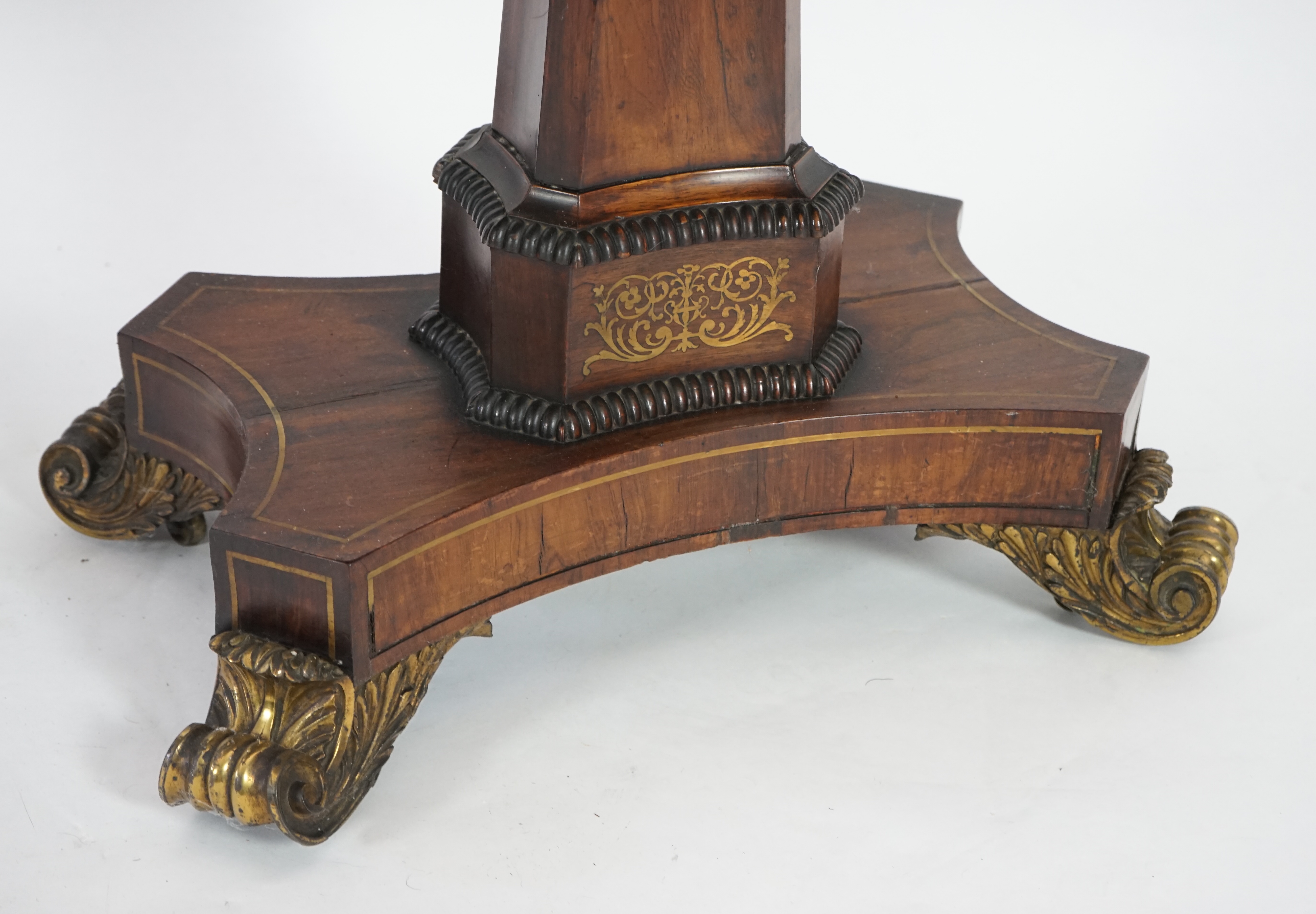 A pair of Regency brass inset rosewood card tables